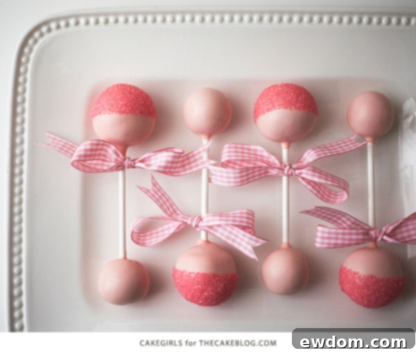 DIY Baby Rattle Cake Pops, perfect for baby showers | by Cakegirls for TheCakeBlog.com