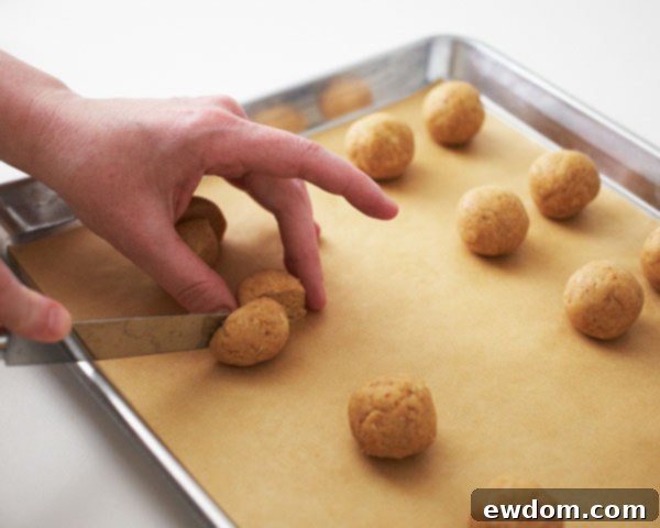 Cut some cake pop balls in half to create smaller rattle ends.