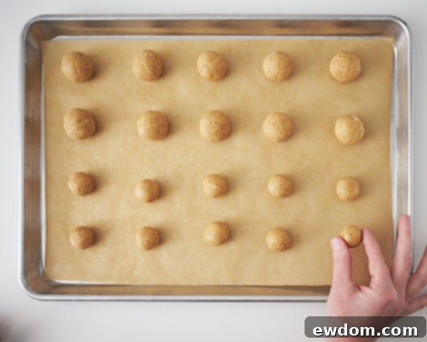 Freeze large and small cake pop balls to harden them.
