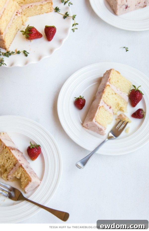 Thyme-Infused Strawberry Bliss 8 Overhead view of a beautifully decorated Strawberry Thyme Cake for summer