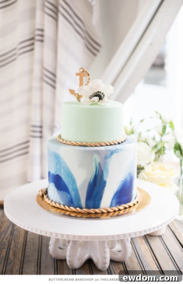 Elegant seafoam green and gold marbled nautical wedding cake by Buttercream Bakeshop