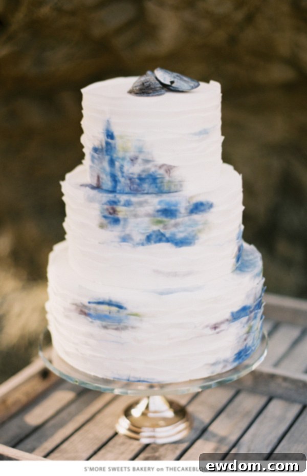 Wavelike ruffled nautical cake with natural ocean colors by S'more Sweets Bakery
