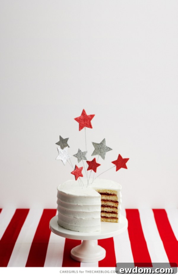 Finished Stars and Stripes Cake decorated with DIY glittery star wire toppers | by Cakegirls for TheCakeBlog.com