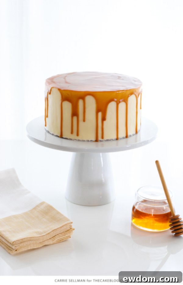 Honey Butter Cake, a glorious three-layer honey cake with a smooth honey cream cheese frosting and a stunning honey butterscotch glaze drizzle.