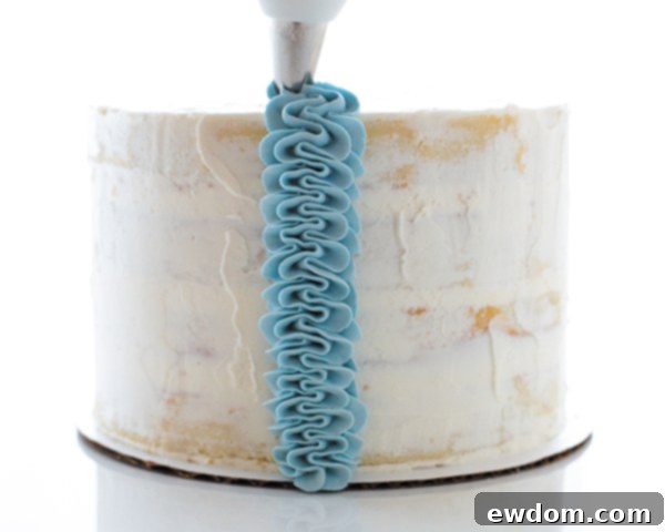 Another view of a finished vertical ruffle section on the fairytale cake