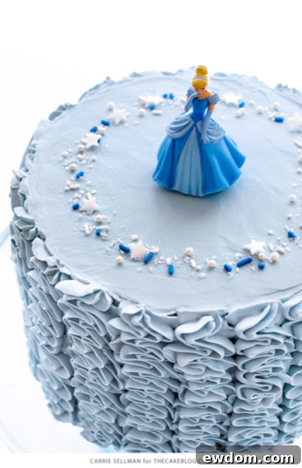 Close-up of the elegant buttercream ruffles on the Cinderella fairytale cake