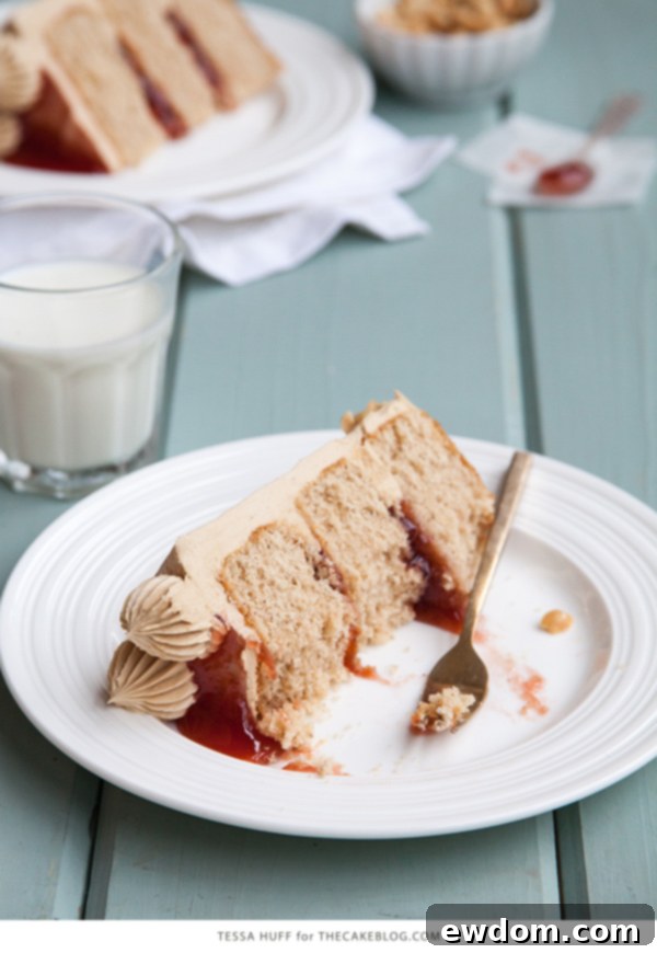 Close-up of a slice of Peanut Butter & Jelly Cake on a plate