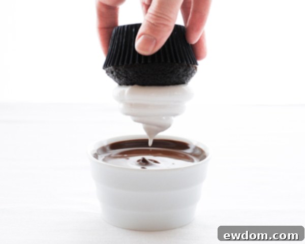 Touchdown Treat Cupcakes 12 NFL Game Day Cupcakes | chocolate cupcakes with fluffy marshmallow frosting and dipped in chocolate. Perfect for football tailgating and homegating.