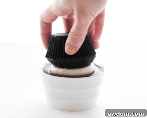 Touchdown Treat Cupcakes 14 cupcake_step_7dNFL Game Day Cupcakes | chocolate cupcakes with fluffy marshmallow frosting and dipped in chocolate. Perfect for football tailgating and homegating.