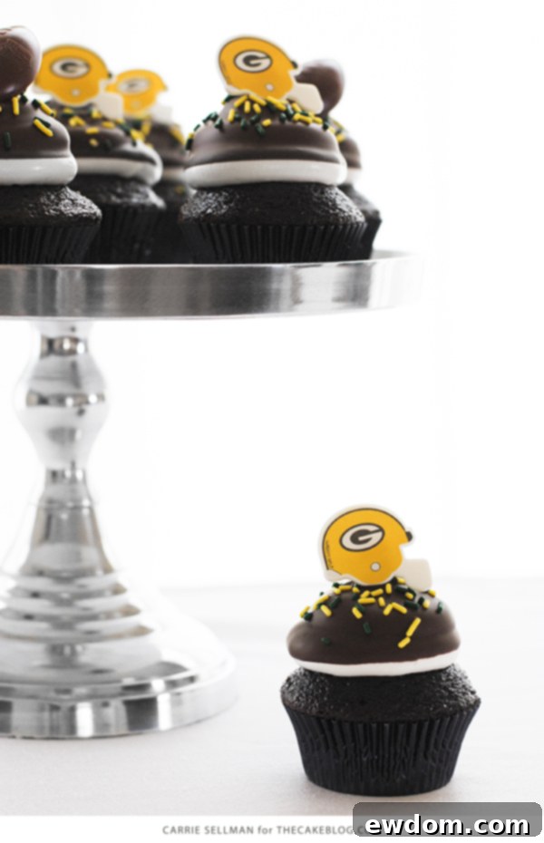 Touchdown Treat Cupcakes 4 NFL Game Day Cupcakes | chocolate cupcakes with fluffy marshmallow frosting and dipped in chocolate. Perfect for football tailgating and homegating.
