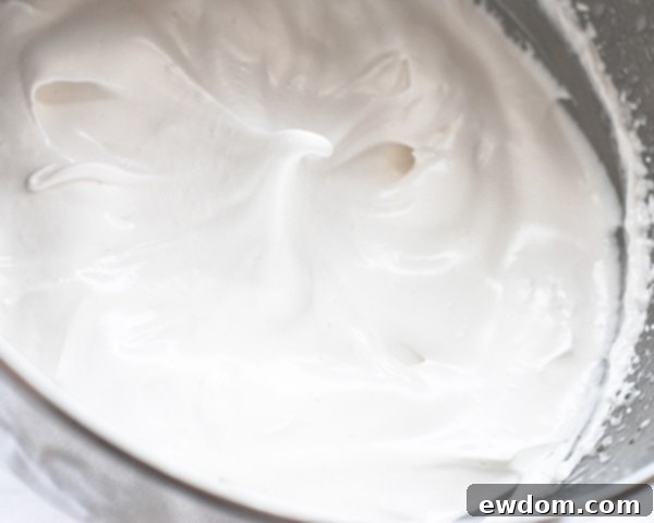 Touchdown Treat Cupcakes 7 NFL Game Day Cupcakes | chocolate cupcakes with fluffy marshmallow frosting and dipped in chocolate. Perfect for football tailgating and homegating.