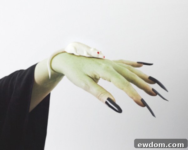 Creepy Mice Cakes! Learn how to make these spooky, red velvet filled, mice cakes -- a Halloween food sure to freak out your party guests | Cakegirls for TheCakeBlog.com