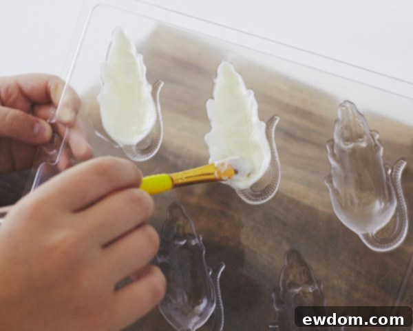 Creepy Mice Cakes! Learn how to make these spooky, red velvet filled, mice cakes -- a Halloween food sure to freak out your party guests | Cakegirls for TheCakeBlog.com