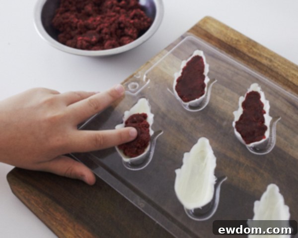 Creepy Mice Cakes! Learn how to make these spooky, red velvet filled, mice cakes -- a Halloween food sure to freak out your party guests | Cakegirls for TheCakeBlog.com