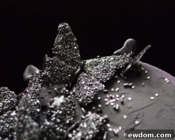 Finished candy melt butterflies, some with silver glitter, ready for cake decoration