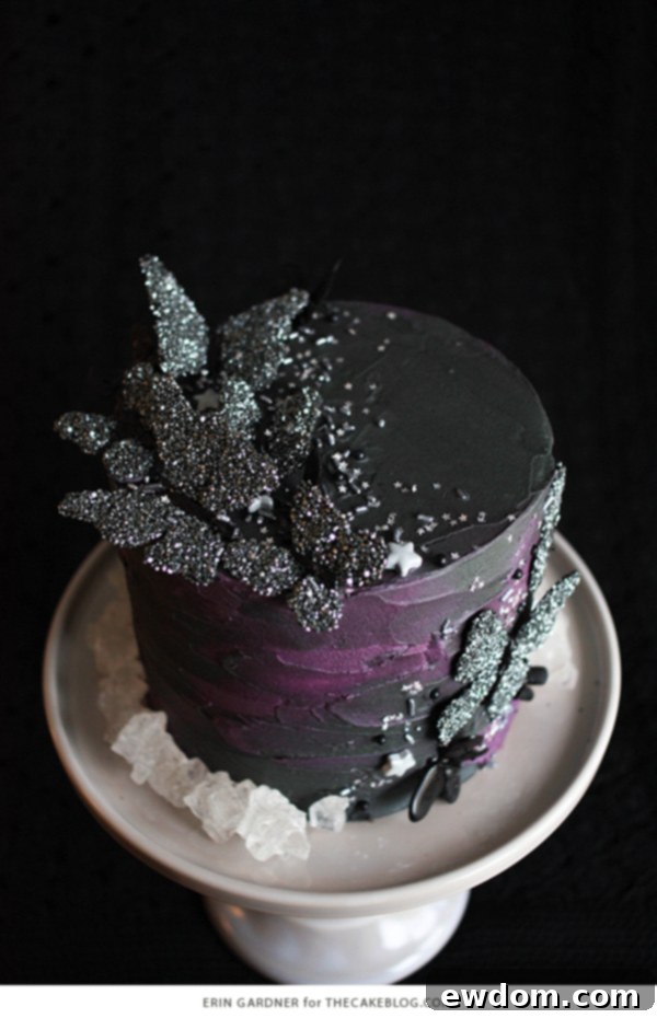 Black Butterfly Halloween cake with rock candy crystals around the base