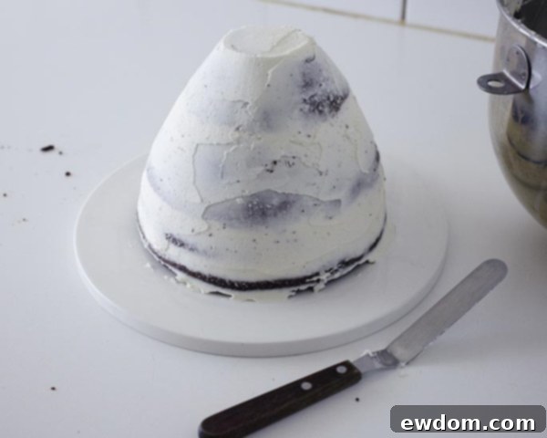 Chilling the crumb-coated cake for a smooth finish