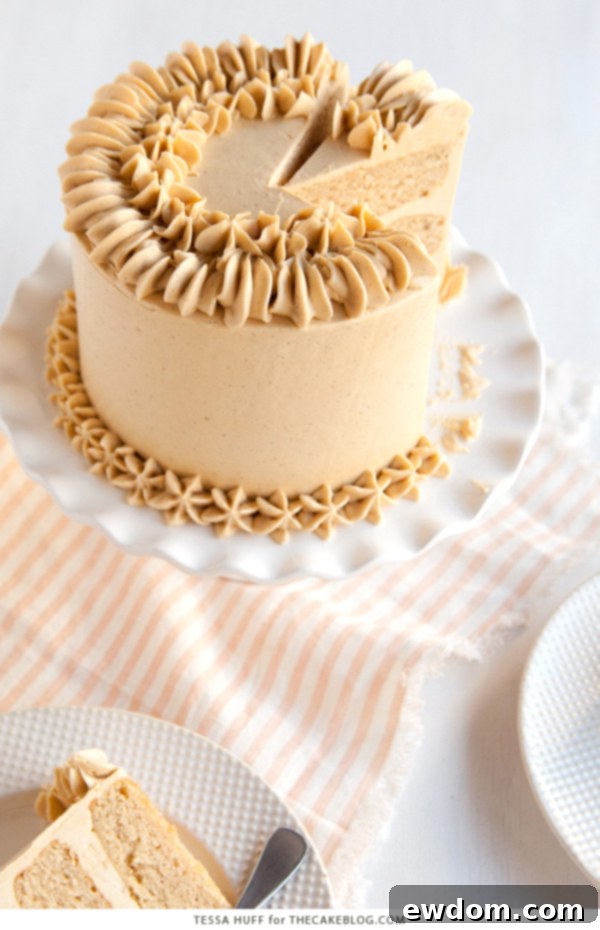 Artfully decorated Maple Pear Cake with rich Maple Spice Frosting and intricate piping