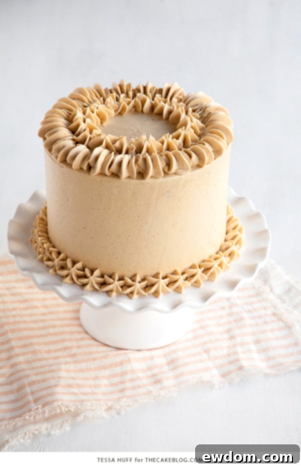 Another beautiful angle of the Maple Pear Cake, showcasing its delightful layers and frosting