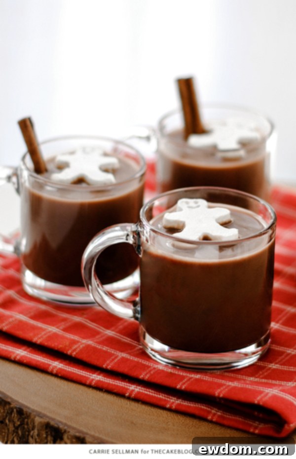 Cloud Cubes 2 Festive Frozen Whipped Cream Cubes Floating on Holiday Hot Chocolate