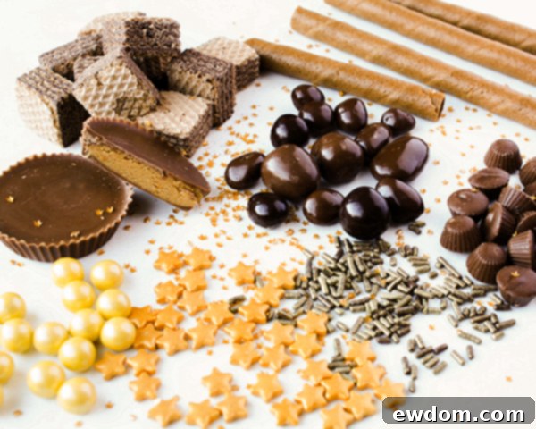 Assortment of candies, chocolates, and cookies chosen for decorating a drippy chocolate cake, by Erin Gardner