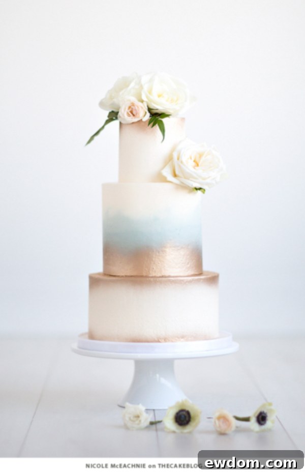Ethereal Creamy White Cake with Fading Gold and Blue Hues by Nicole McEachnie | TheCakeBlog.com