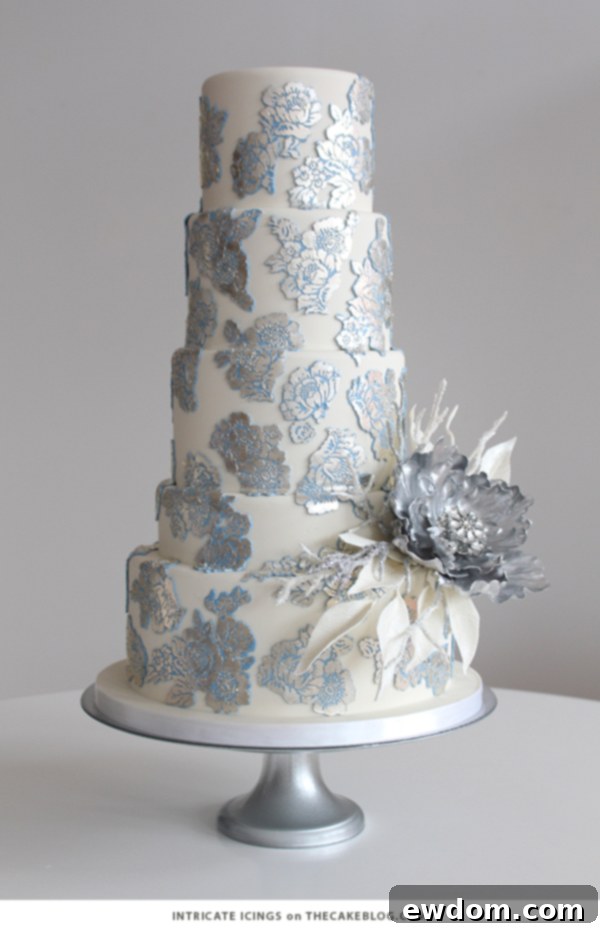 Frosty Glacier Blue and Silver Leaf Winter Cake with Sugar Flower by Intricate Icings Cake Design | TheCakeBlog.com