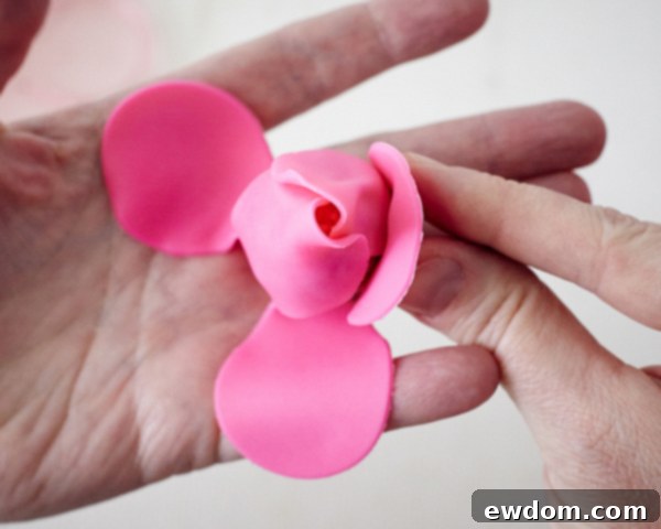 Blossom Cake Pops 17 Completing the rose form by wrapping petals #4 and #5, flaring edges for realism.