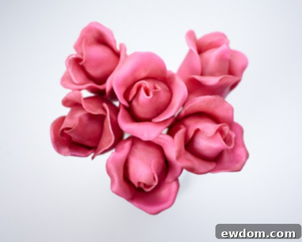 Blossom Cake Pops 22 The finished rose cake pop, beautifully dusted with luster dust for a vibrant, realistic glow.