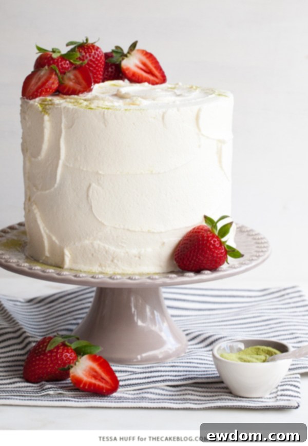 Strawberry Matcha Delight 3 Matcha Strawberry Cake by Tessa Huff, showcasing vibrant green matcha sponge layers with fresh red strawberries and fluffy white frosting.