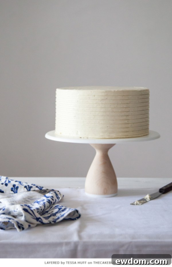 London Fog Cloud Cake 4 Close-up of London Fog Cake layers: moist chocolate cake, creamy Earl Grey buttercream, and a drizzle of salted caramel