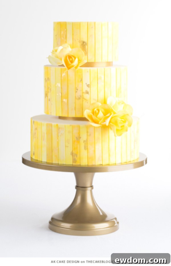 Bold abstract cake inspired by Rothko painting with saturated tones of yellow and saffron that appear to glow, by AK Cake Design.