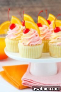 Delicious Tequila Sunrise Cupcakes with two-tone frosting