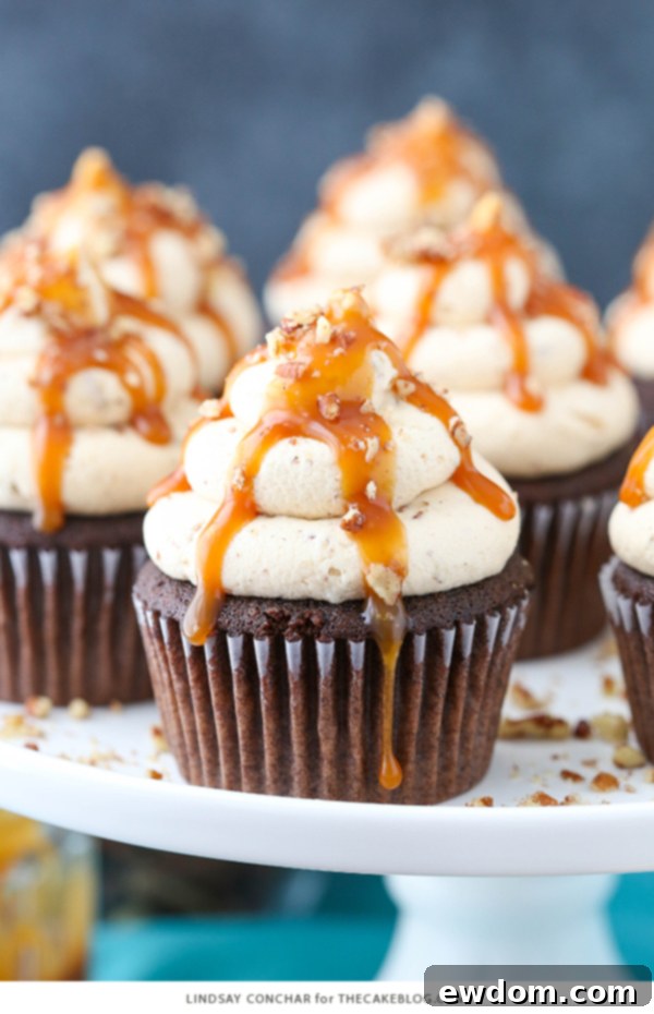 Gooey Chocolate Caramel Pecan Cupcakes 3 Chocolate Turtle Cupcakes - from scratch recipe for rich chocolate cupcakes with caramel pecan frosting, caramel drizzle and chopped pecans | by Lindsay Conchar for TheCakeBlog.com