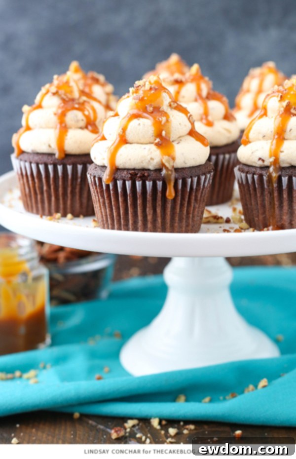 Gooey Chocolate Caramel Pecan Cupcakes 5 Chocolate Turtle Cupcakes - from scratch recipe for rich chocolate cupcakes with caramel pecan frosting, caramel drizzle and chopped pecans | by Lindsay Conchar for TheCakeBlog.com