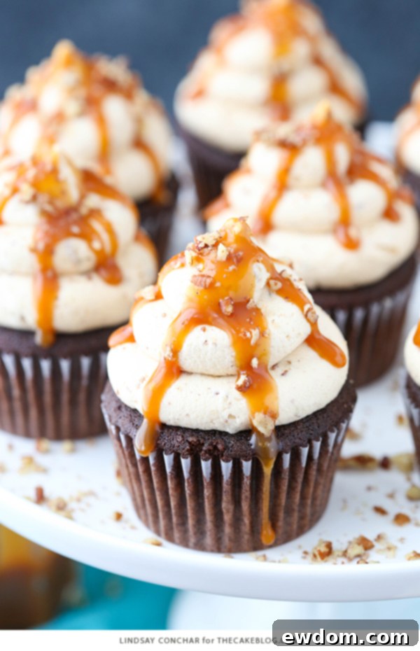 Gooey Chocolate Caramel Pecan Cupcakes 6 Chocolate Turtle Cupcakes - from scratch recipe for rich chocolate cupcakes with caramel pecan frosting, caramel drizzle and chopped pecans | by Lindsay Conchar for TheCakeBlog.com