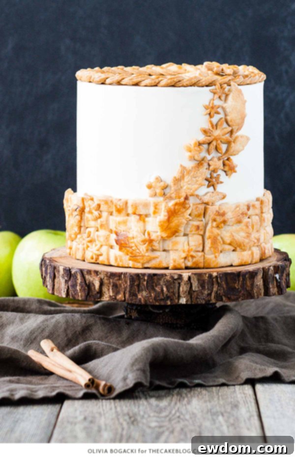 Apple Pie Cake: A stunning layer cake featuring cinnamon and nutmeg spiced cake, fresh apple pie filling, smooth buttercream, and intricate braided pie crust lattice - by Olivia Bogacki for TheCakeBlog.com