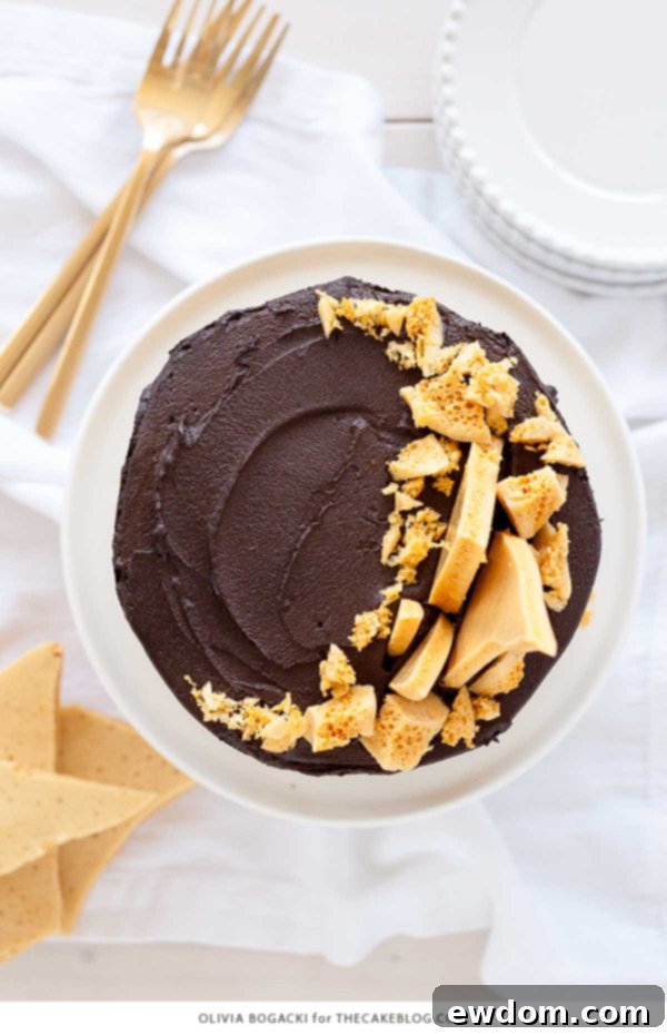 Dark Chocolate Honeycomb Cake - a rich chocolate layer cake recipe with ultra dark, fudgy frosting and homemade honeycomb | by Olivia Bogacki for TheCakeBlog.com