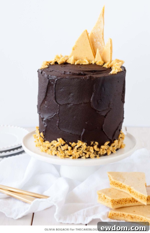 Dark Chocolate Honeycomb Cake - a rich chocolate layer cake recipe with ultra dark, fudgy frosting and homemade honeycomb | by Olivia Bogacki for TheCakeBlog.com