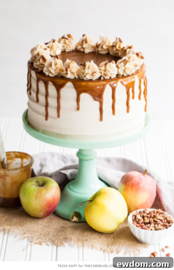 Apple Toffee Crunch Cake - fresh apple cake with crunchy pecans, cinnamon buttercream and a toffee sauce drip | by Tessa Huff for TheCakeBlog.com