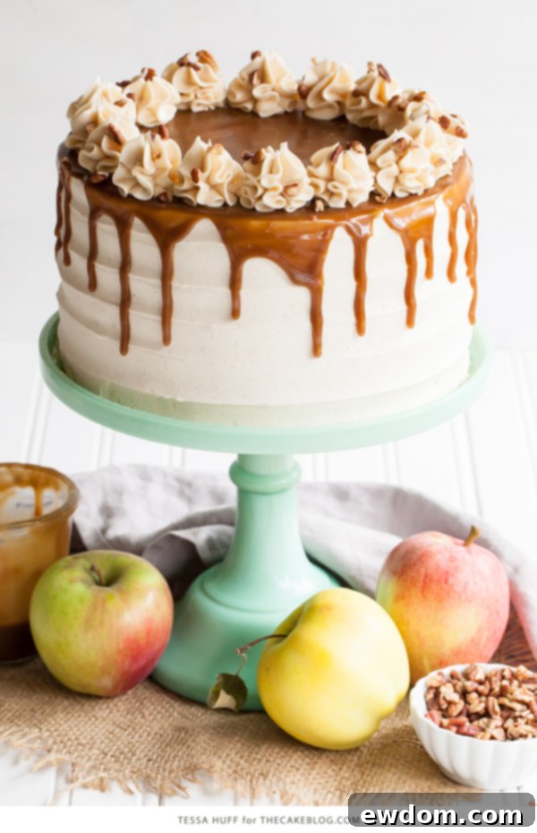 Apple Toffee Crunch Cake - fresh apple cake with crunchy pecans, cinnamon buttercream and a toffee sauce drip | by Tessa Huff for TheCakeBlog.com