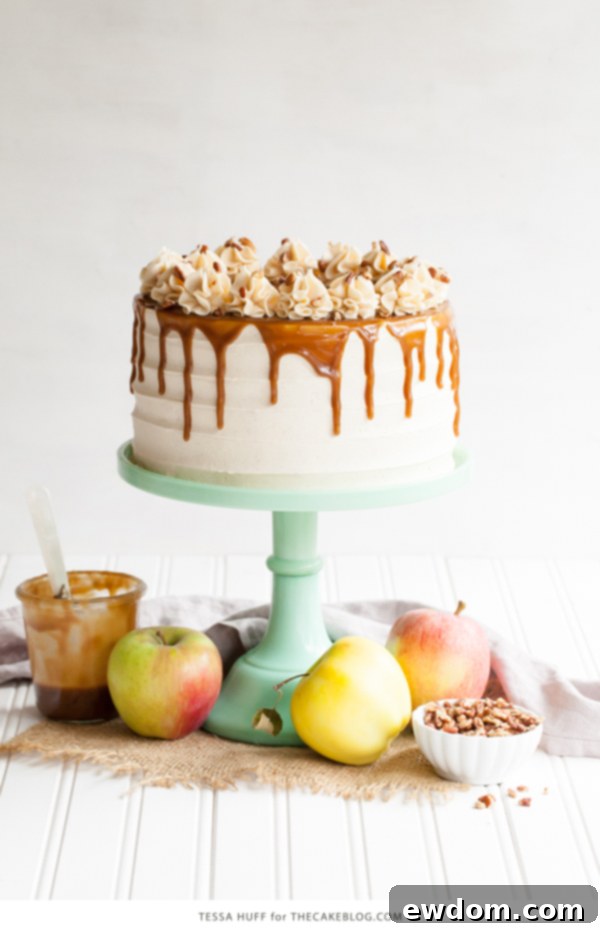 Apple Toffee Crunch Cake - fresh apple cake with crunchy pecans, cinnamon buttercream and a toffee sauce drip | by Tessa Huff for TheCakeBlog.com