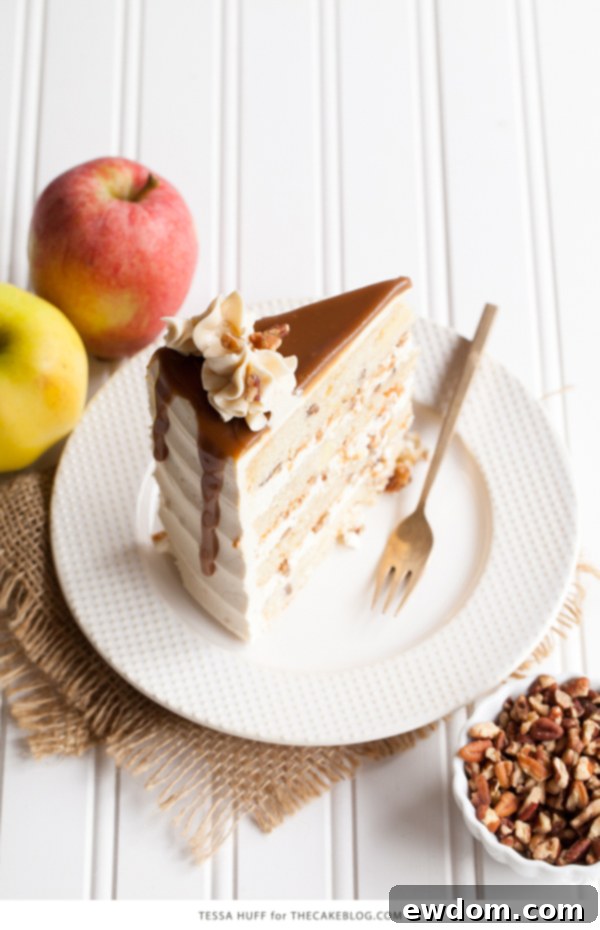 Apple Toffee Crunch Cake - fresh apple cake with crunchy pecans, cinnamon buttercream and a toffee sauce drip | by Tessa Huff for TheCakeBlog.com