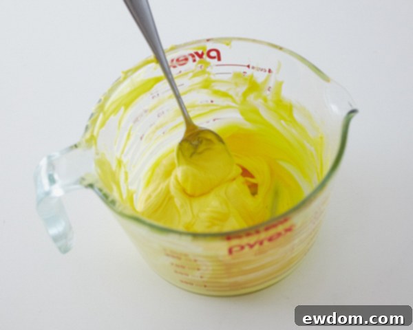 Melting Yellow Candy Coating in a Microwave-Safe Bowl