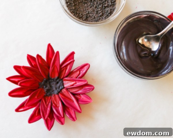 Completed chocolate sunflower with two petal layers, hardening in the bowl