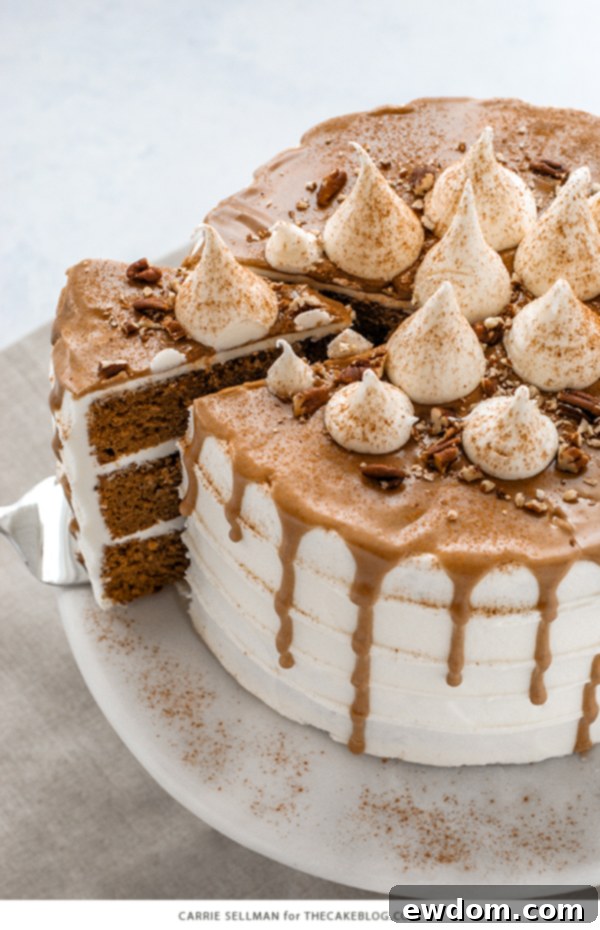 Sweet Potato Cake with marshmallow frosting, drippy maple glaze, chopped pecans and cinnamon | by Carrie Sellman for TheCakeBlog.com