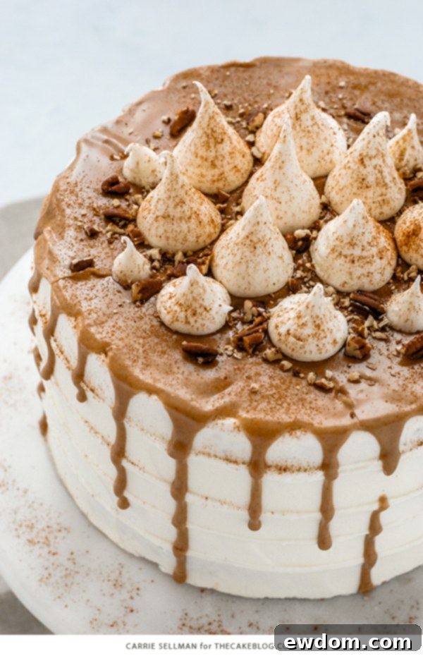 Sweet Potato Cake with marshmallow frosting, drippy maple glaze, chopped pecans and cinnamon | by Carrie Sellman for TheCakeBlog.com