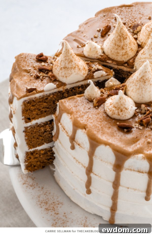 Sweet Potato Cake with marshmallow frosting, drippy maple glaze, chopped pecans and cinnamon | by Carrie Sellman for TheCakeBlog.com