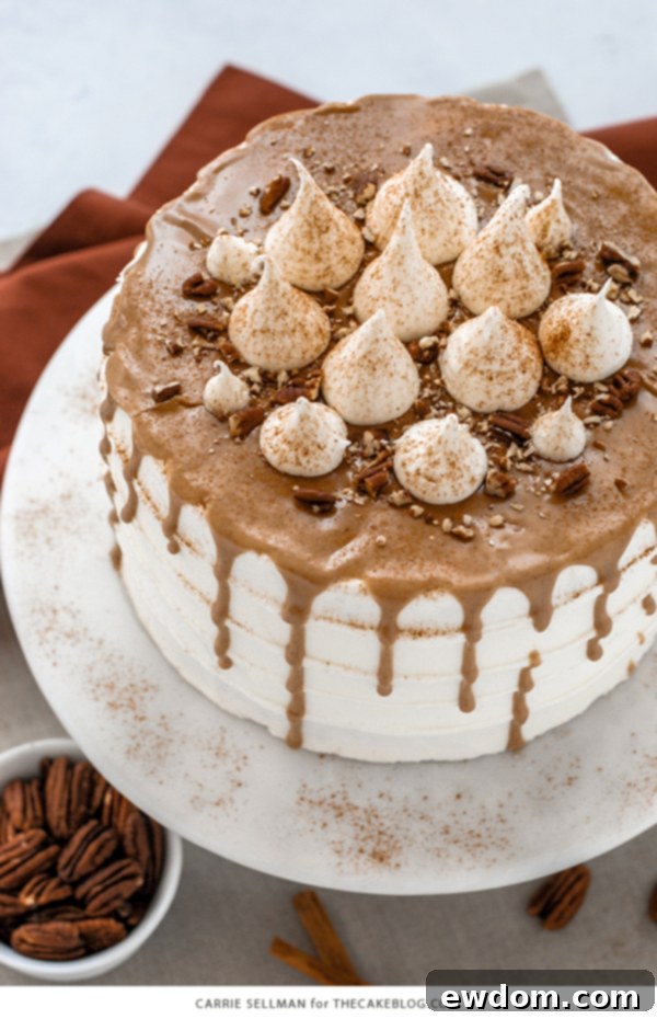 Sweet Potato Cake with marshmallow frosting, drippy maple glaze, chopped pecans and cinnamon | by Carrie Sellman for TheCakeBlog.com