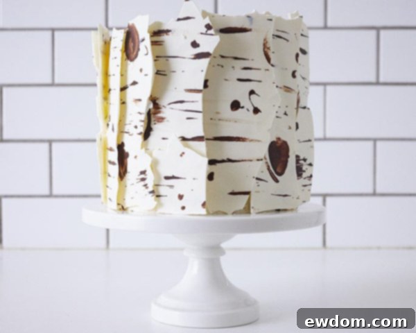 Birch Log Cake! Learn how to make this wintry, birch cake that looks just like a natural birch branch | by Cakegirls for TheCakeBlog.com